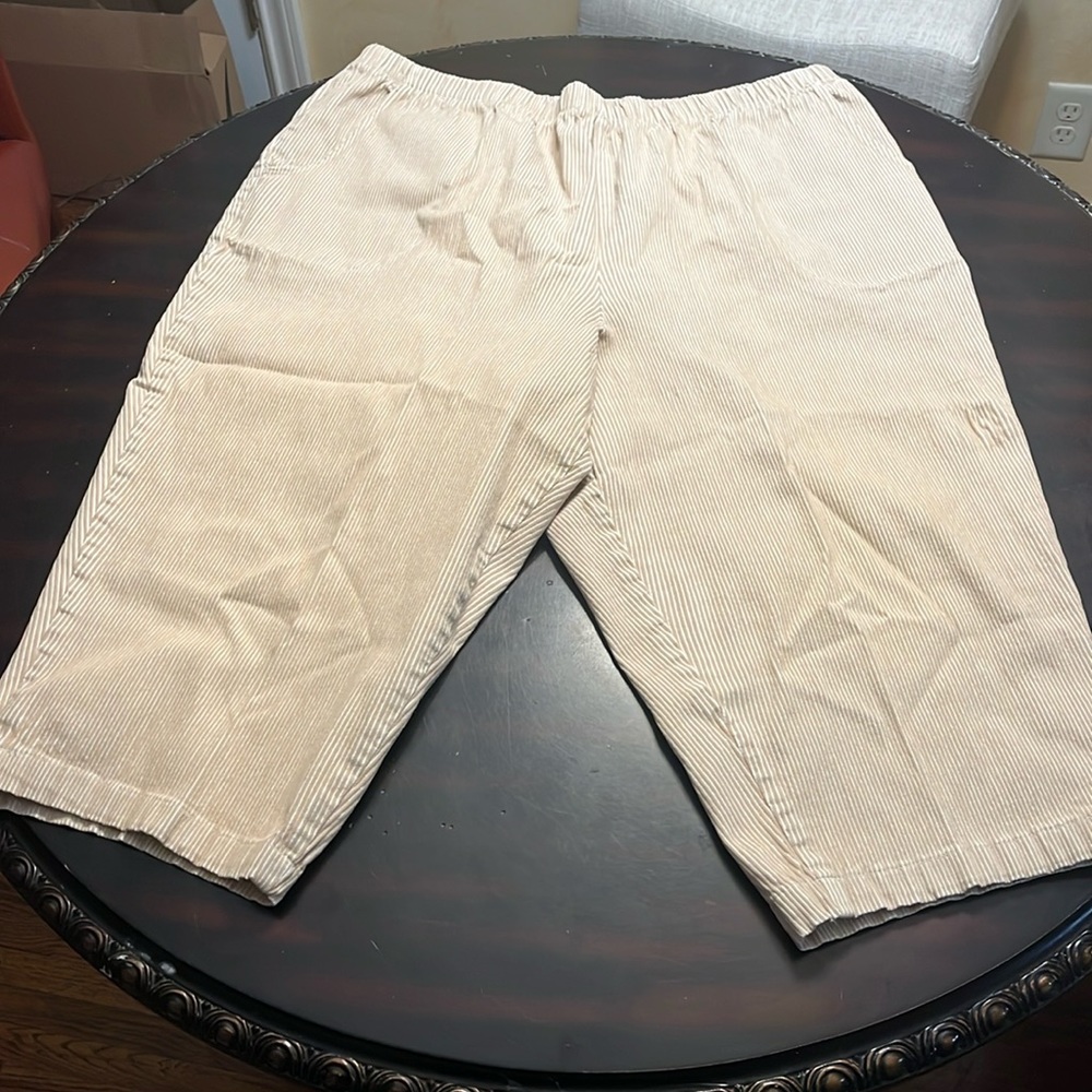 Tan and white striped plus size capris.